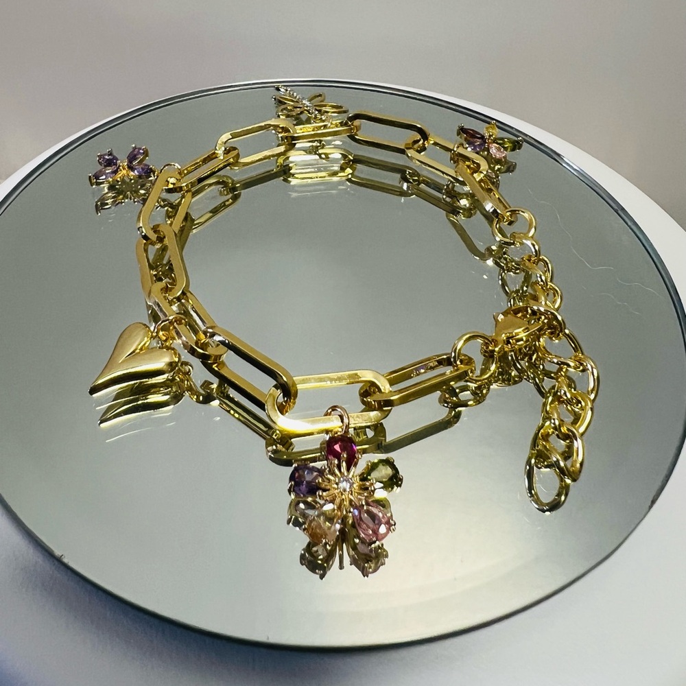Hand Crafted Gold Bracelet with Purple and Pink Accents